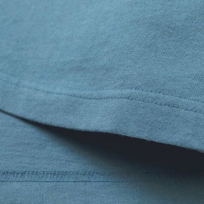 MADNESS BADGE (S) UNIFORM T-SHIRT-BLUE