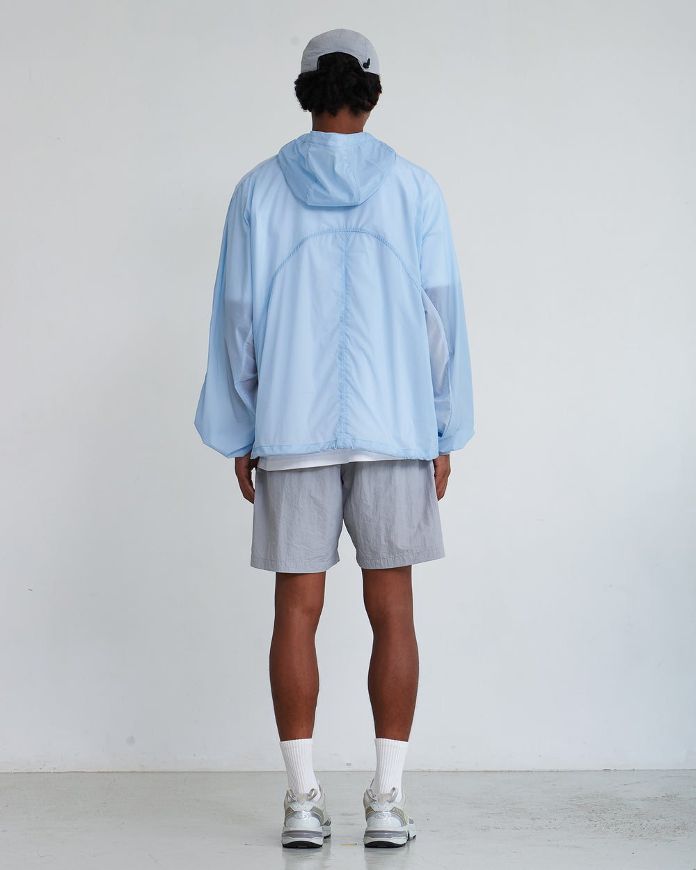 NINE POINT NINE LAGOON TRANSPARENT WINDBREAKER-BLUE