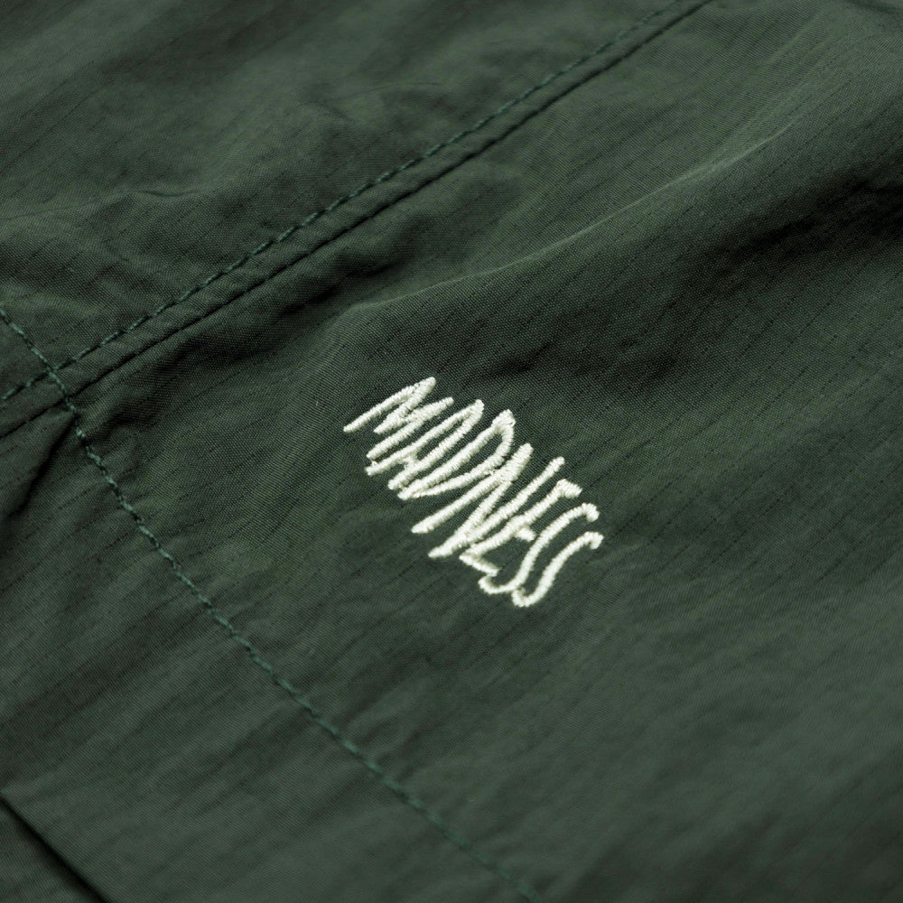 MADNESS LOGO TECH SHORTS 15"-DARK GREEN