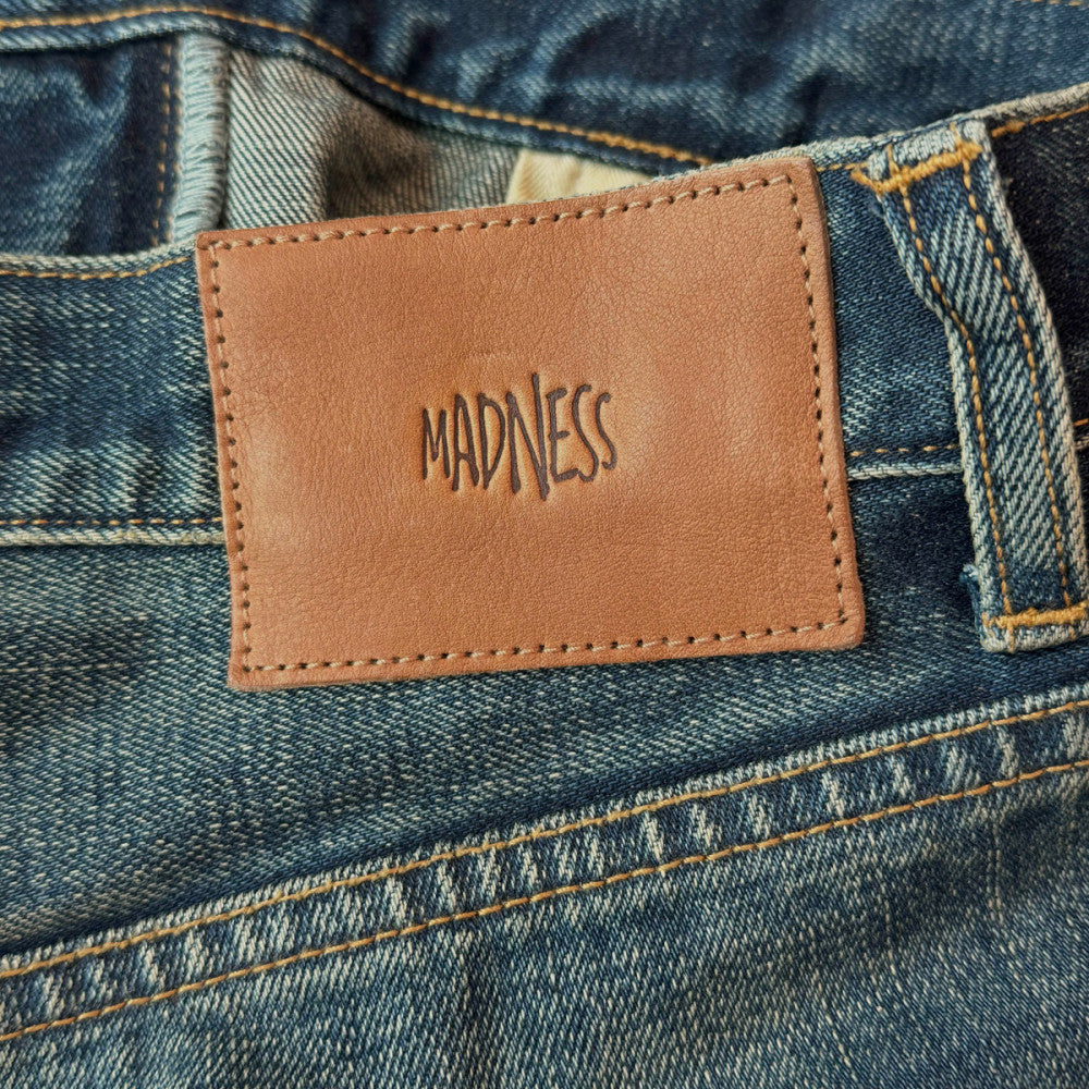 MADNESS STANDARD 5P WASHED DENIM PANTS. M2 RELAXED-INDIGO