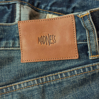 MADNESS STANDARD 5P WASHED DENIM PANTS. M2 RELAXED-INDIGO