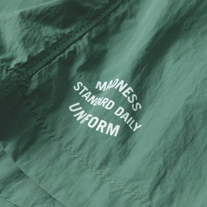 MADNESS STD LOGO NYLON ESSENTIAL SHORTS (16")-AQUA GREEN