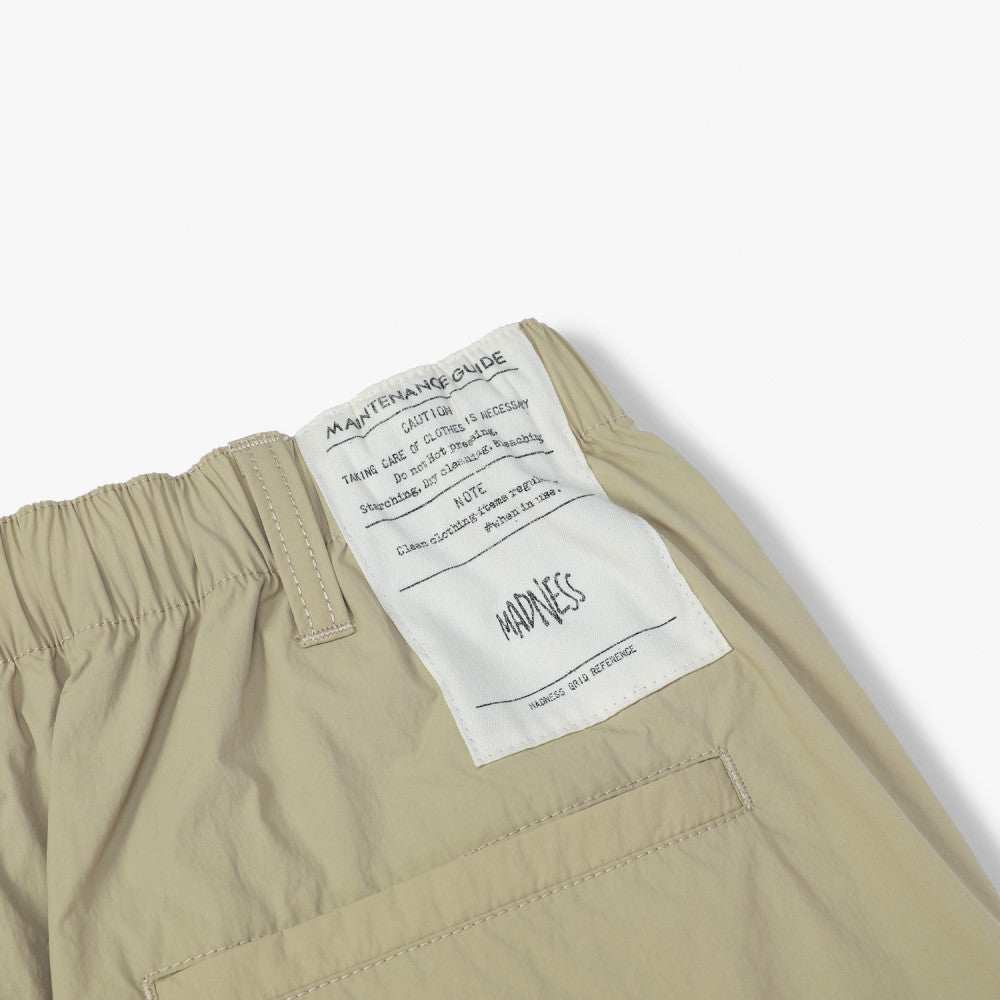 MADNESS TRAINER SHORTS-BEIGE