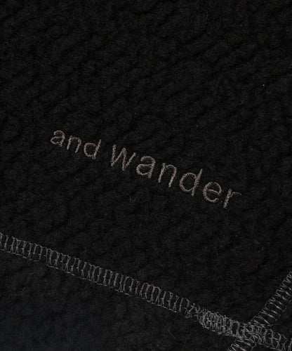 AND WANDER RE WOOL JQ CREW NECK-BLACK