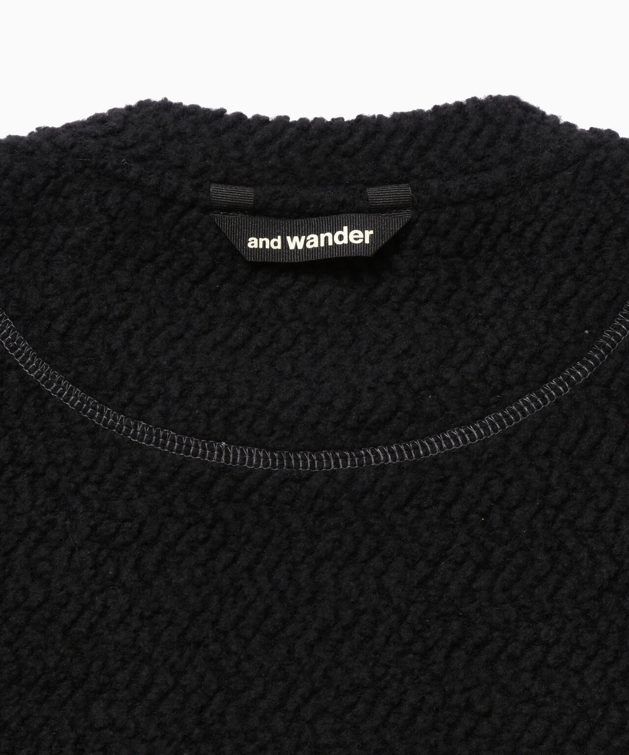 AND WANDER RE WOOL JQ CREW NECK-BLACK