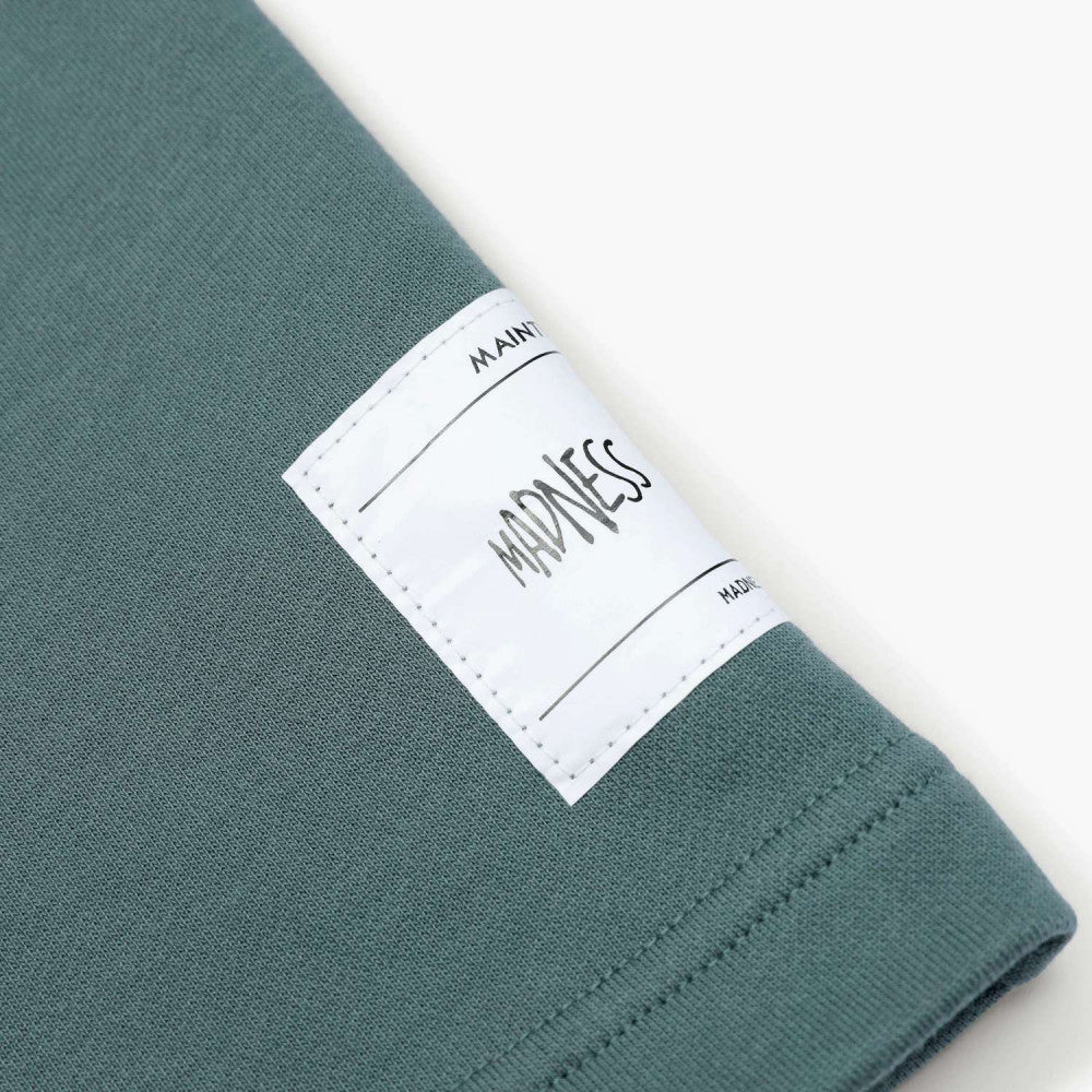 MADNESS SOLID CREW TEE. BOXY-SOMKE GREEN