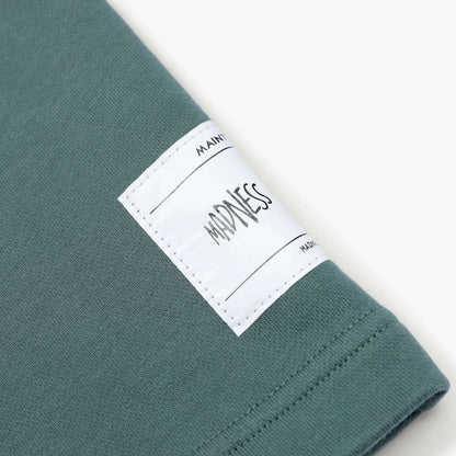 MADNESS SOLID CREW TEE. BOXY-SOMKE GREEN