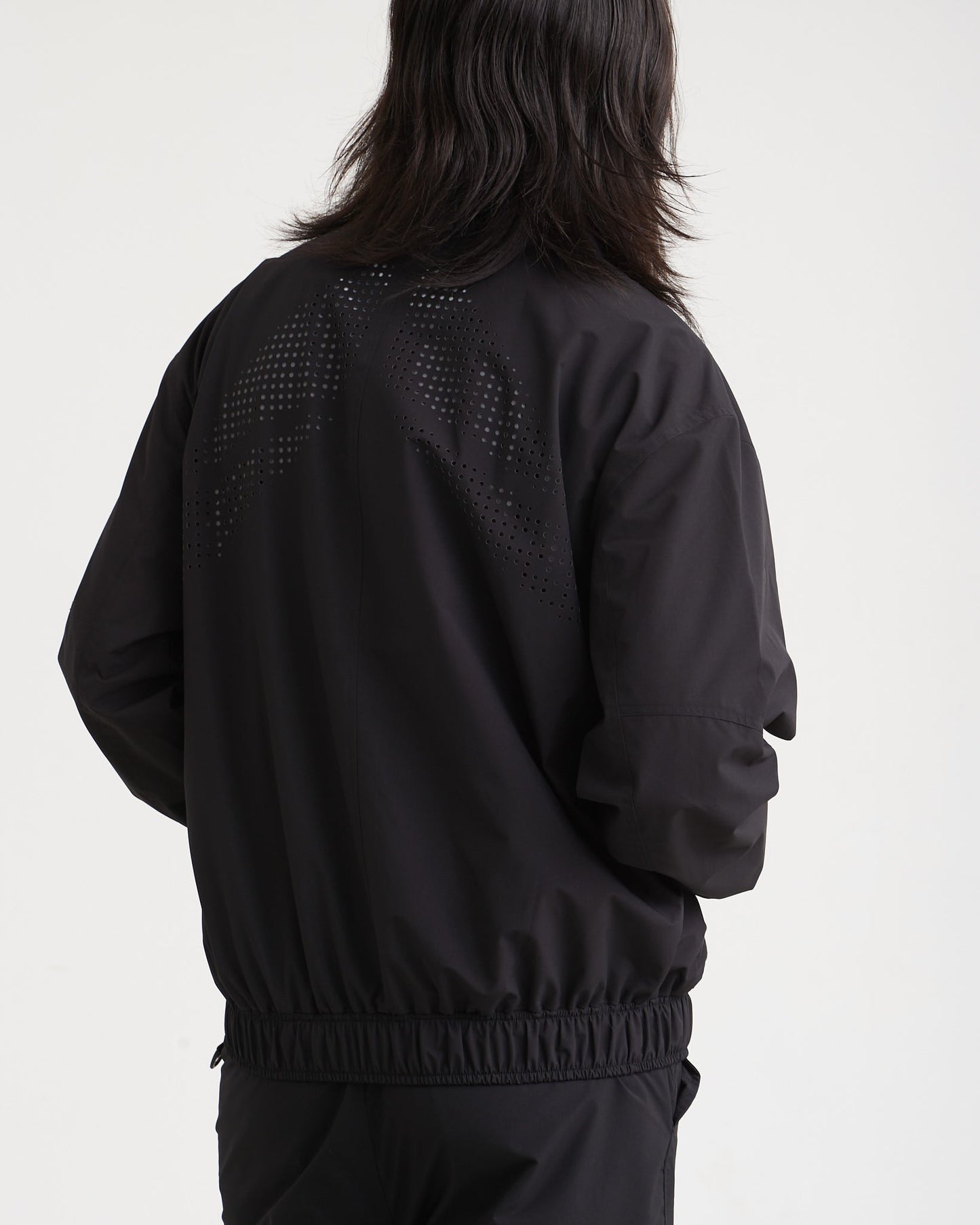 NINE POINT NINE SPIRAL LASER COACH JACKET-BLACK