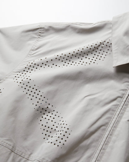 NINE POINT NINE SPIRAL LASER COACH JACKET-IVORY