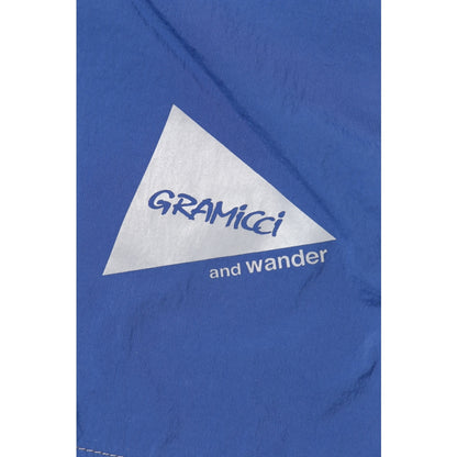 AND WANDER X GRAMICCI BRUSHED NYLON JACKET-BLUE