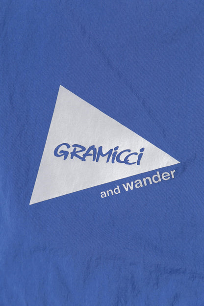 AND WANDER X GRAMICCI BRUSHED NYLON VEST-BLUE
