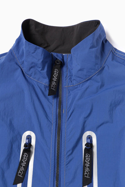 AND WANDER X GRAMICCI BRUSHED NYLON VEST-BLUE