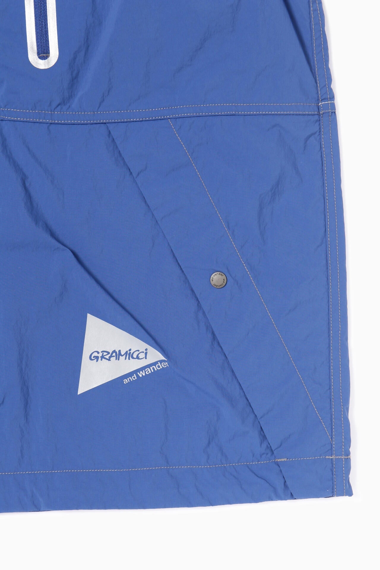 AND WANDER X GRAMICCI BRUSHED NYLON VEST-BLUE